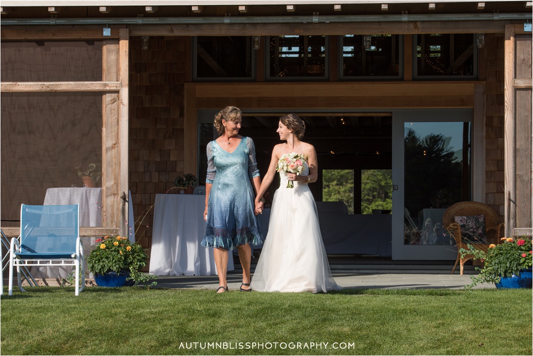 mom-walks-daughter-down-aisle-maine-wedding.jpg