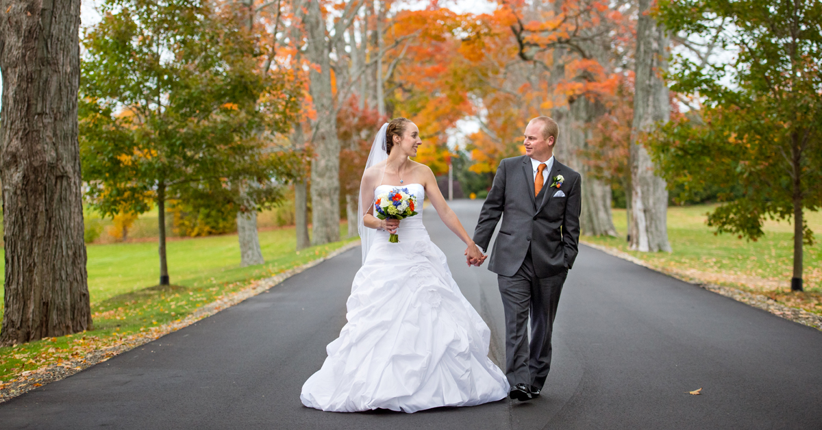 Wedding Couple Walking in Foliage