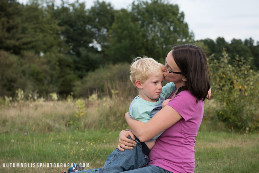 mother-kissing-son-nh-family-photography