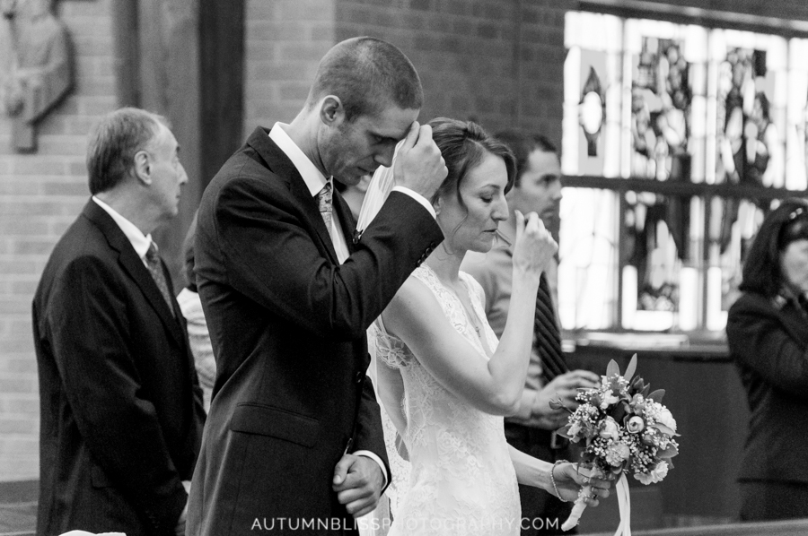 wedding-couple-praying-bw