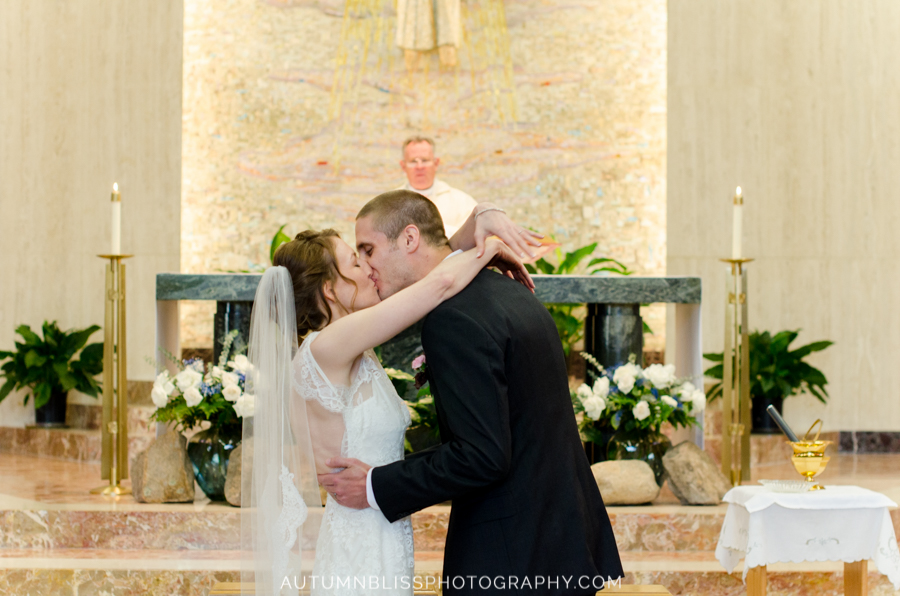 bride-groom-first-kiss-church