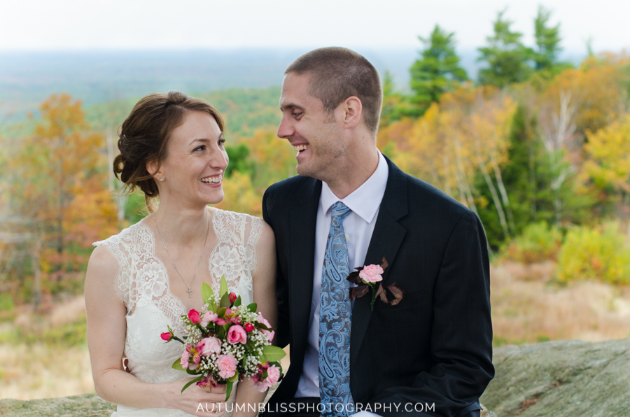 bride-and-groom-adoring-each-other-atop-mt-agamenticus-york-maine