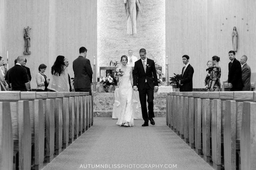 bride-and-groom-walking-down-aisle-recessional