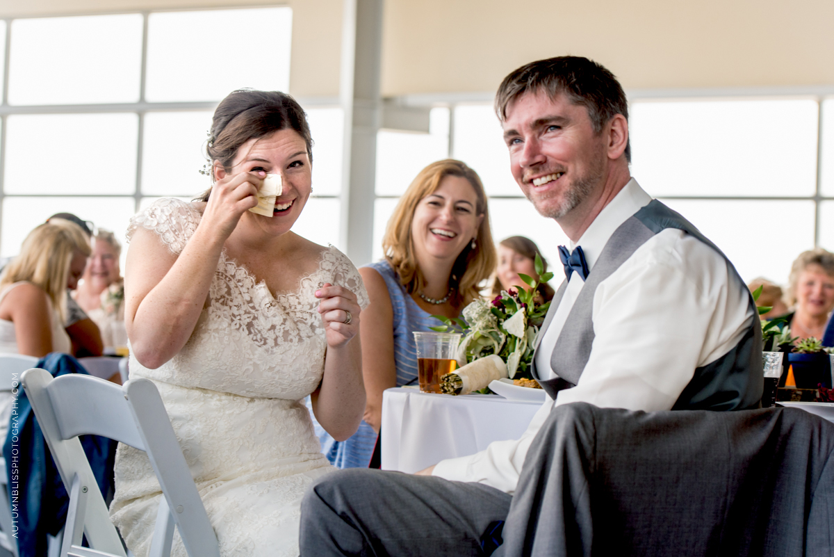 wedding-couple-sitting-laughing-crying