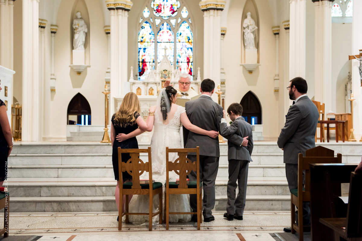 bride-groom-and-kids-altar